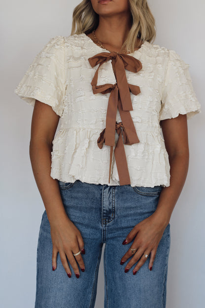 *RESTOCKING 12/28* Bailey Babydoll Bow Tie Top- Cream